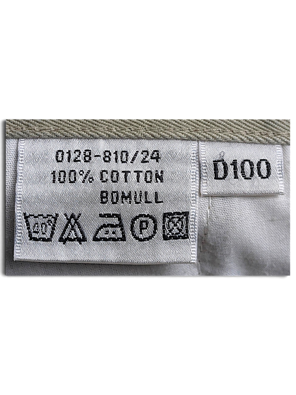 JAKE & IPI Rappson cargo trousers care label showing 100% cotton composition and D100 size tag