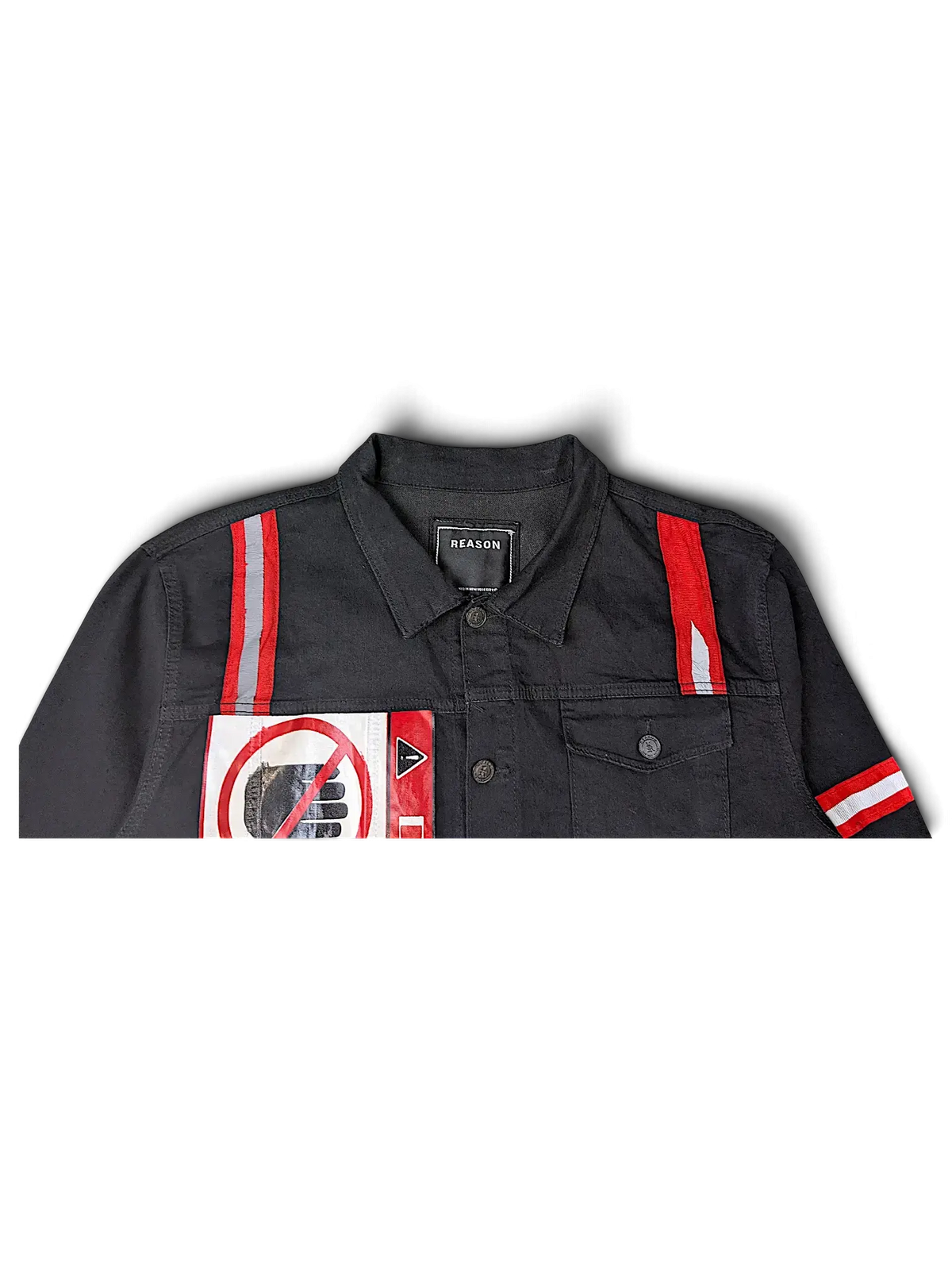 JAKE & IPI Reason black denim jacket featuring red and white reflective shoulder stripes and a graphic chest patch.