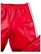 JAKE & IPI red Adidas leather pants with white side stripes and zippered pockets