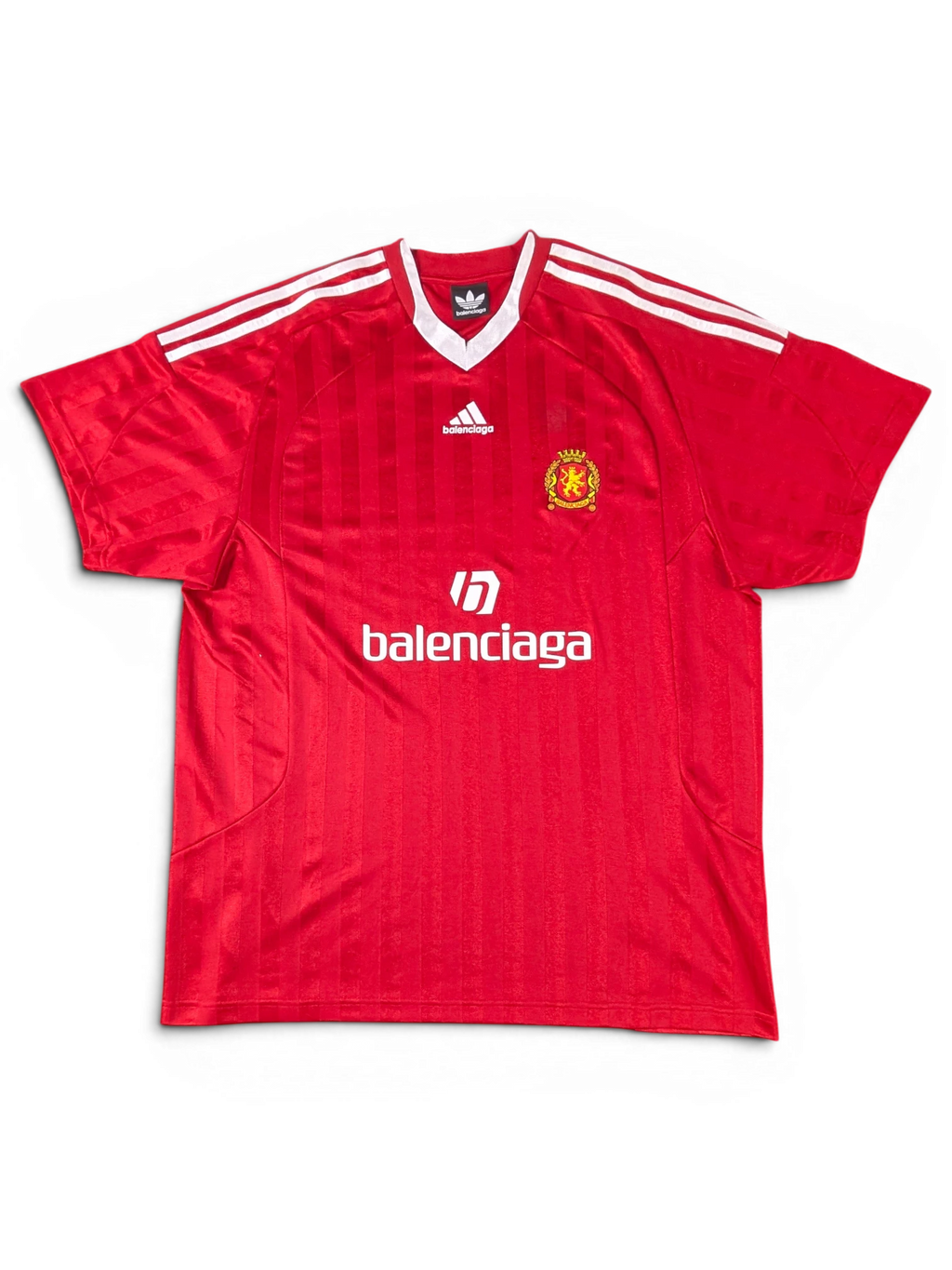 JAKE & IPI red Balenciaga x Adidas collaborative soccer jersey with white stripes and logo detailing