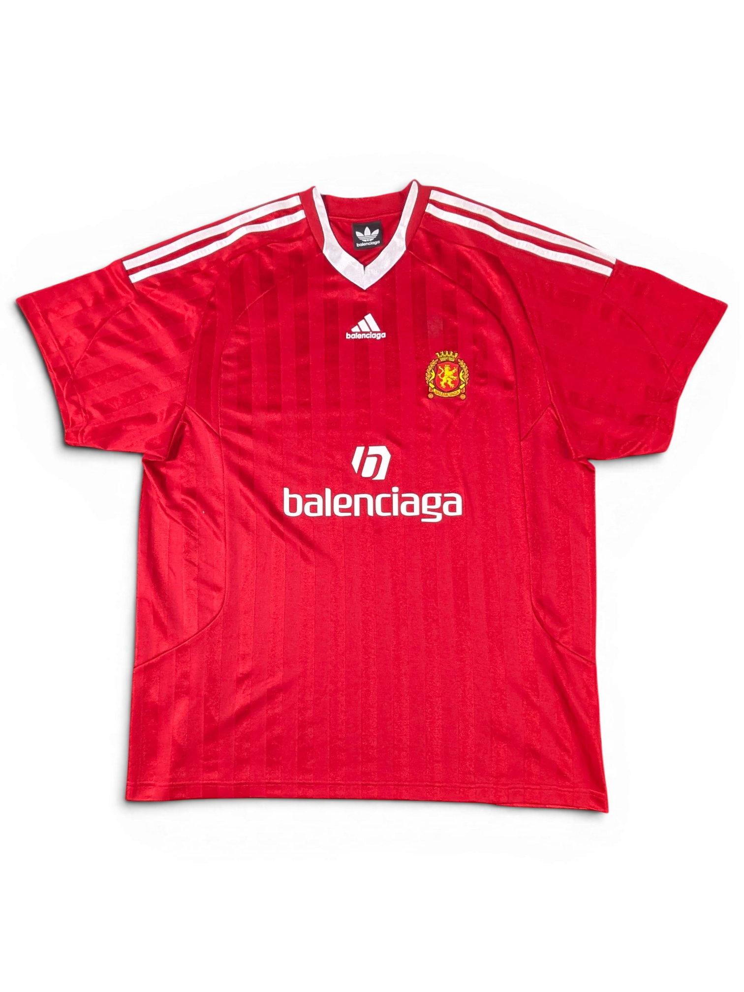 JAKE & IPI red Balenciaga x Adidas collaborative soccer jersey with white stripes and logo detailing