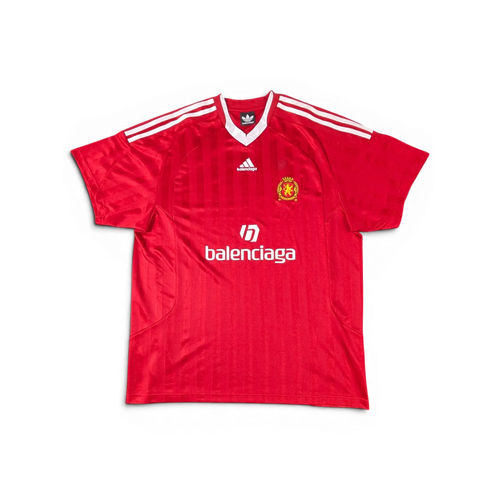 JAKE & IPI red Balenciaga x Adidas collaborative soccer jersey with white stripes and logo detailing
