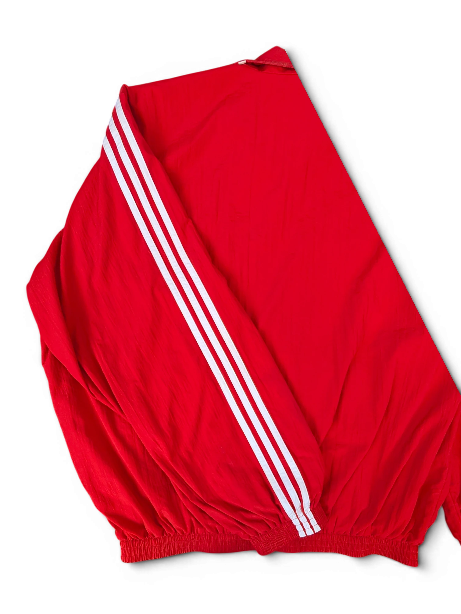 JAKE & IPI red Balenciaga x Adidas track jacket with iconic white three-stripe sleeve detailing