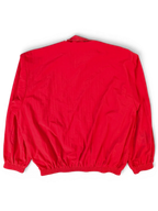 JAKE & IPI red Balenciaga x Adidas windbreaker jacket, back view showing crinkled nylon fabric and elasticated hem.