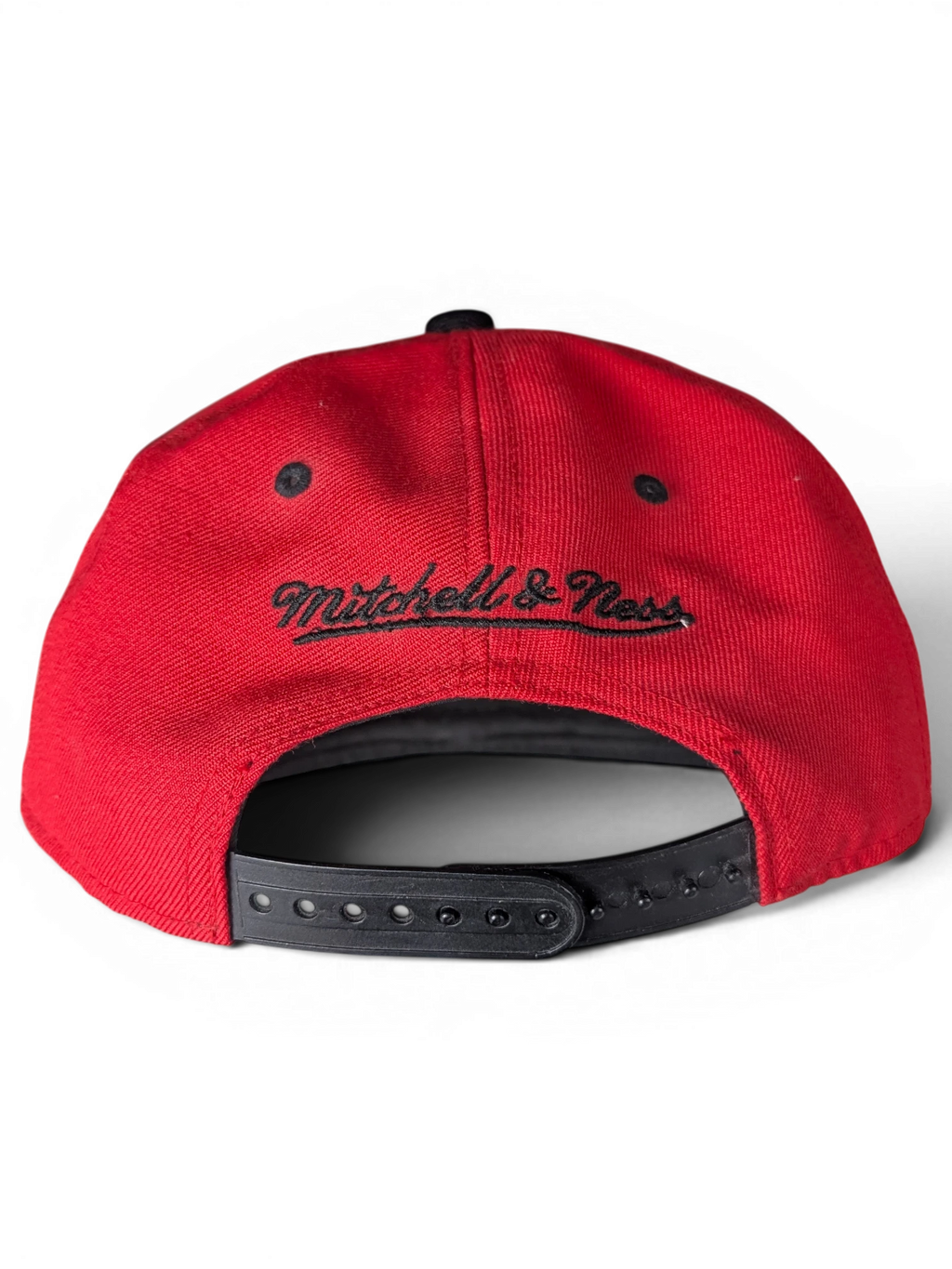 JAKE & IPI red Chicago Bulls snapback cap with black Mitchell & Ness embroidery on the back