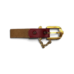 JAKE & IPI red leather belt featuring a polished gold-tone buckle and decorative chain detail