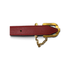 JAKE & IPI red leather belt featuring a polished gold-tone buckle and decorative chain hardware detail.