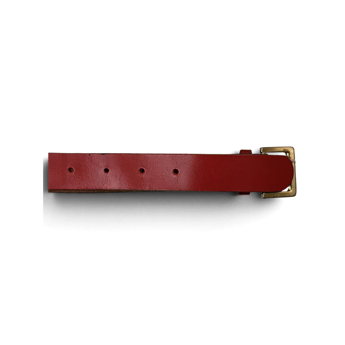 JAKE & IPI red leather belt featuring a gold-tone buckle and classic pin holes on a white background