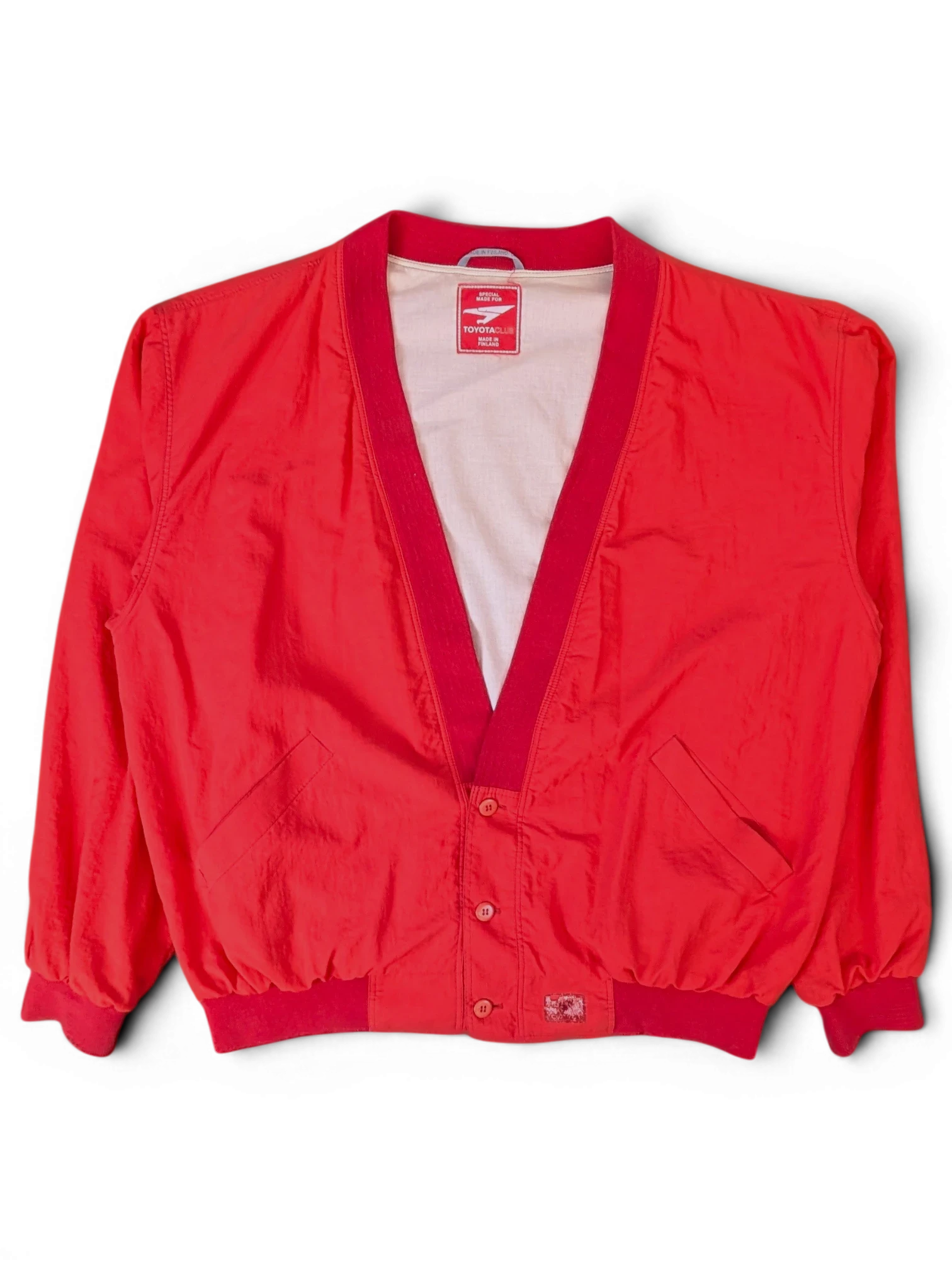 JAKE & IPI vintage red Toyota club button-up windbreaker jacket with a V-neck collar and ribbed cuffs.