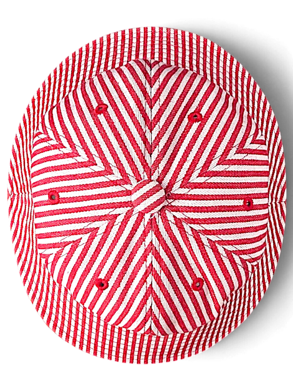 Top view of the JAKE & IPI Time Is On bucket hat featuring a red and white striped pattern and ventilation eyelets.