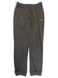 JAKE & IPI pre-owned black Reebok track pants with tapered fit, cuffed ankles, and white logo detail.