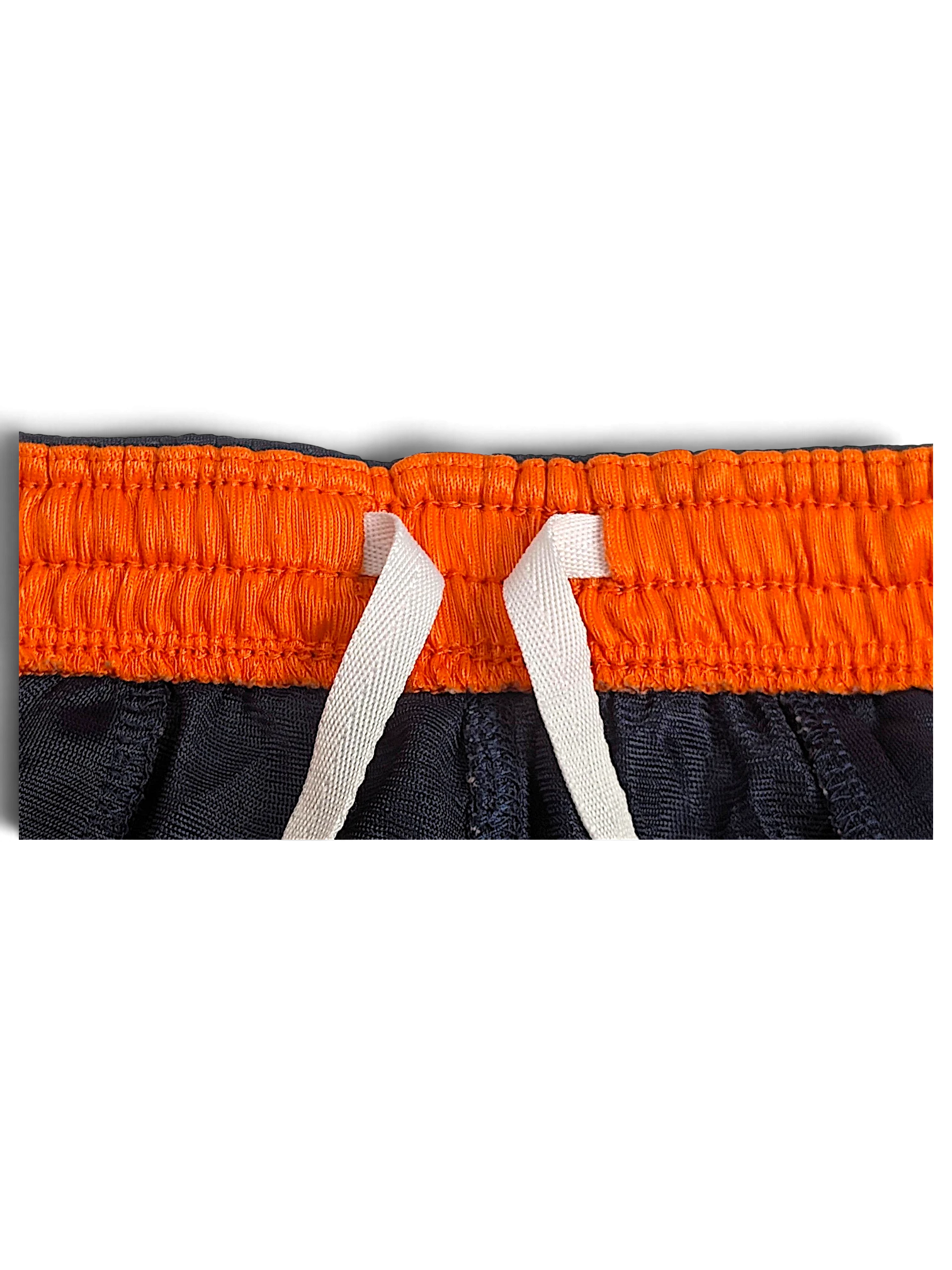 JAKE & IPI Reebok Chicago Bears navy and orange polyester track pants with an elastic drawstring waistband