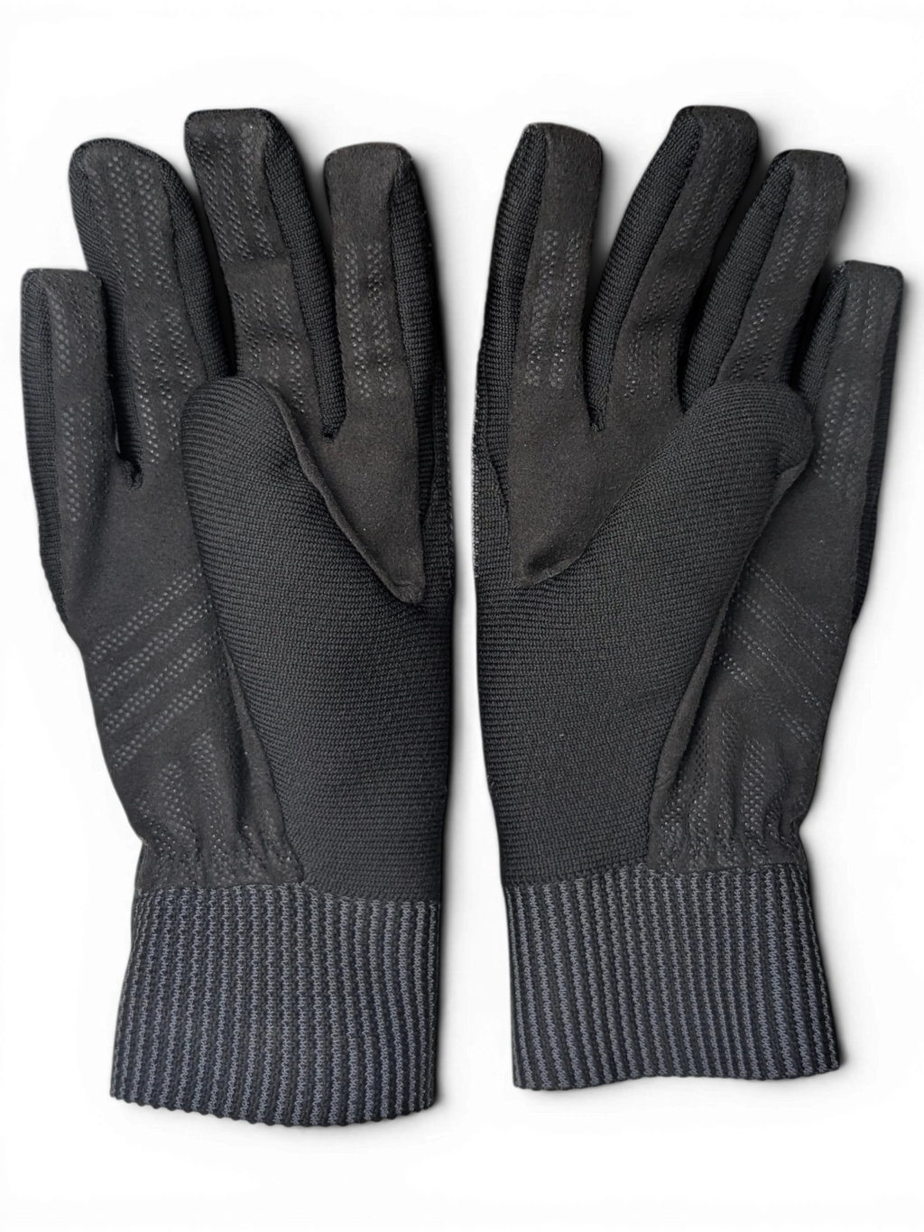 JAKE & IPI Reusch for Prada black technical gloves with ribbed cuffs and textured grip detailing in a cardboard box
