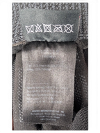JAKE & IPI Reusch for Prada black glove care and material label showing polyester composition and washing symbols