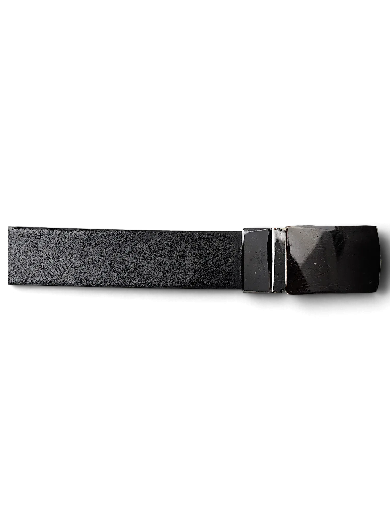 JAKE & IPI reversible belt featuring a smooth black leather strap and a polished metal buckle