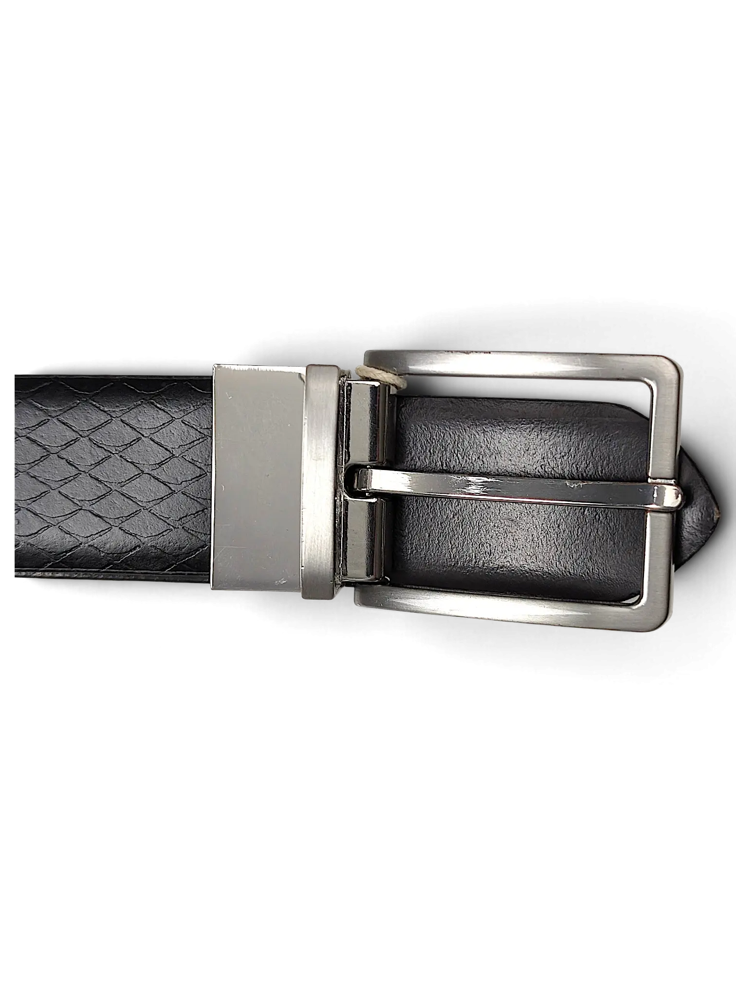 JAKE & IPI reversible belt featuring a black textured side and a silver-tone metal buckle