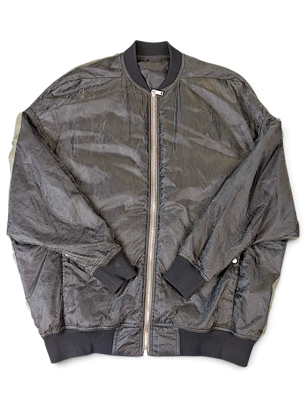 JAKE & IPI Rick Owens black bomber jacket with a crinkled texture, ribbed cuffs, and a silver front zipper.