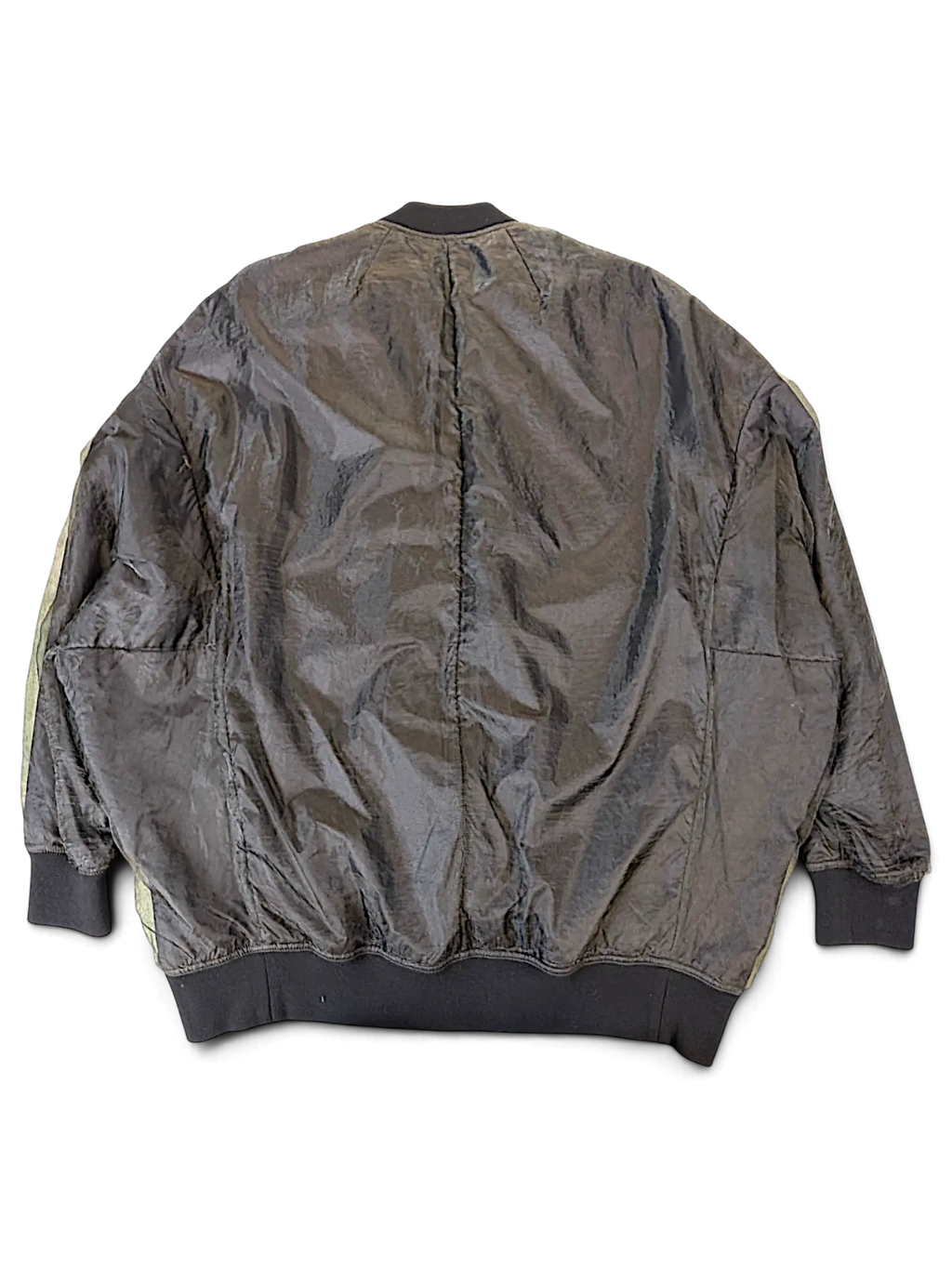 Back view of a JAKE & IPI Rick Owens bomber jacket in a dark, crinkled polyester outer fabric with ribbed cuffs and hem.
