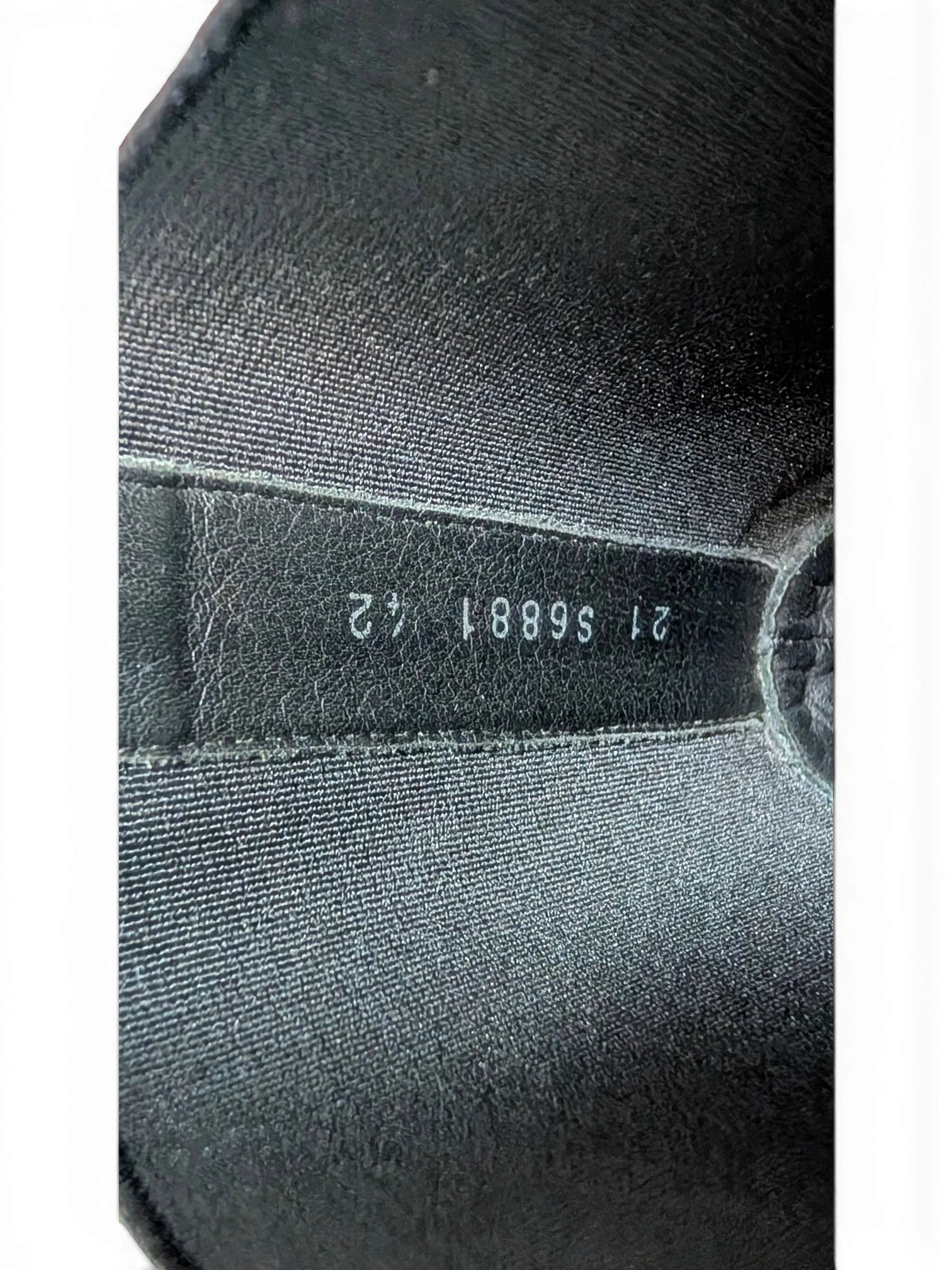 Interior label of JAKE & IPI Rick Owens Beatle Bozo Tractor boots showing serial number 21 S6881 42 on black leather