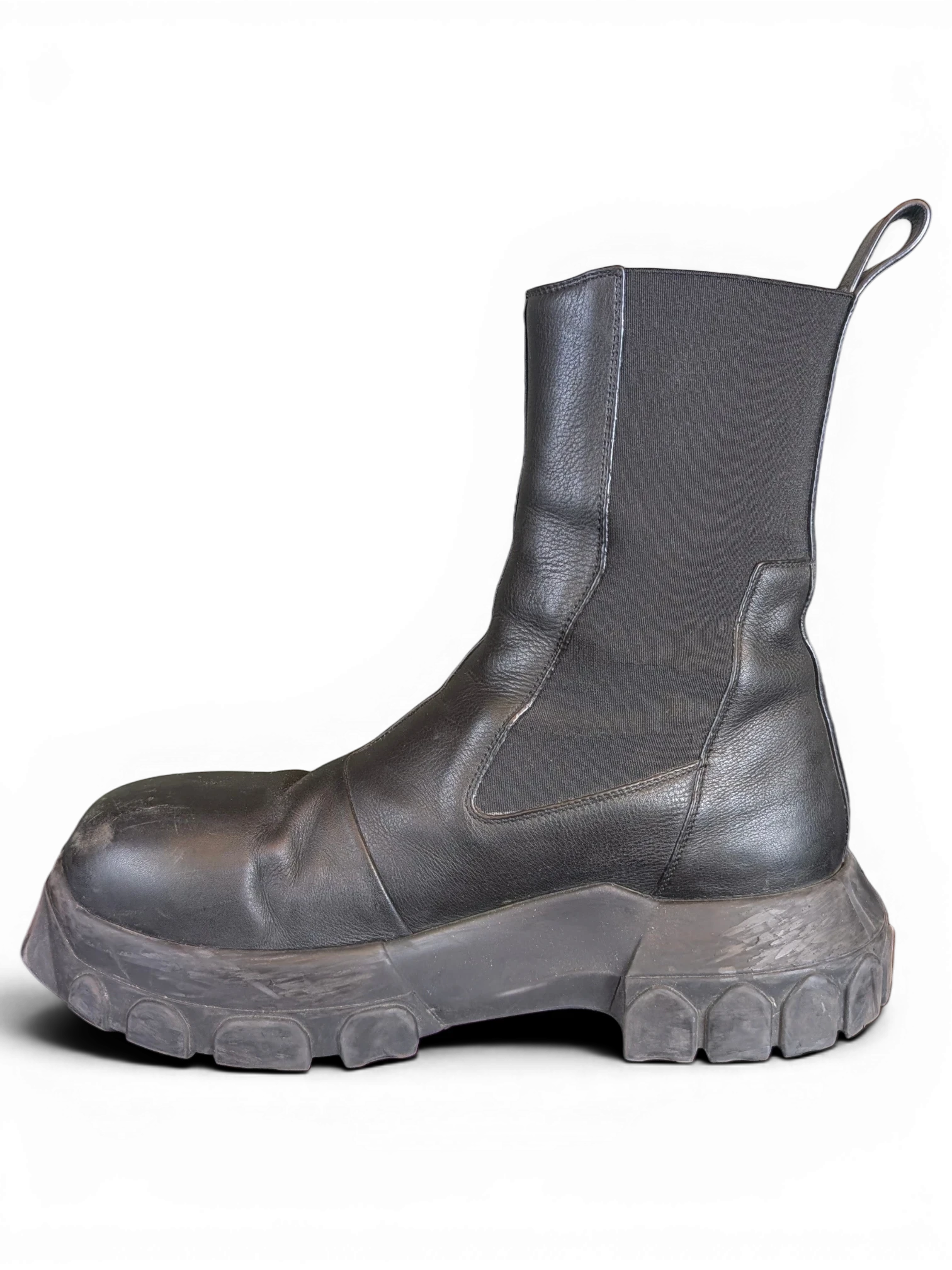 JAKE & IPI Rick Owens Beatle Bozo Tractor boots in metallic black leather with an oversized lug sole and side panels.
