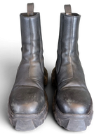 JAKE & IPI Rick Owens Beatle Bozo Tractor boots in metallic black leather with an oversized lug sole.
