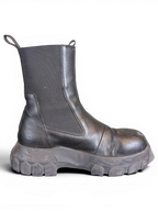 JAKE & IPI Rick Owens Beatle Bozo Tractor boots in metallic black leather with an oversized lug sole.