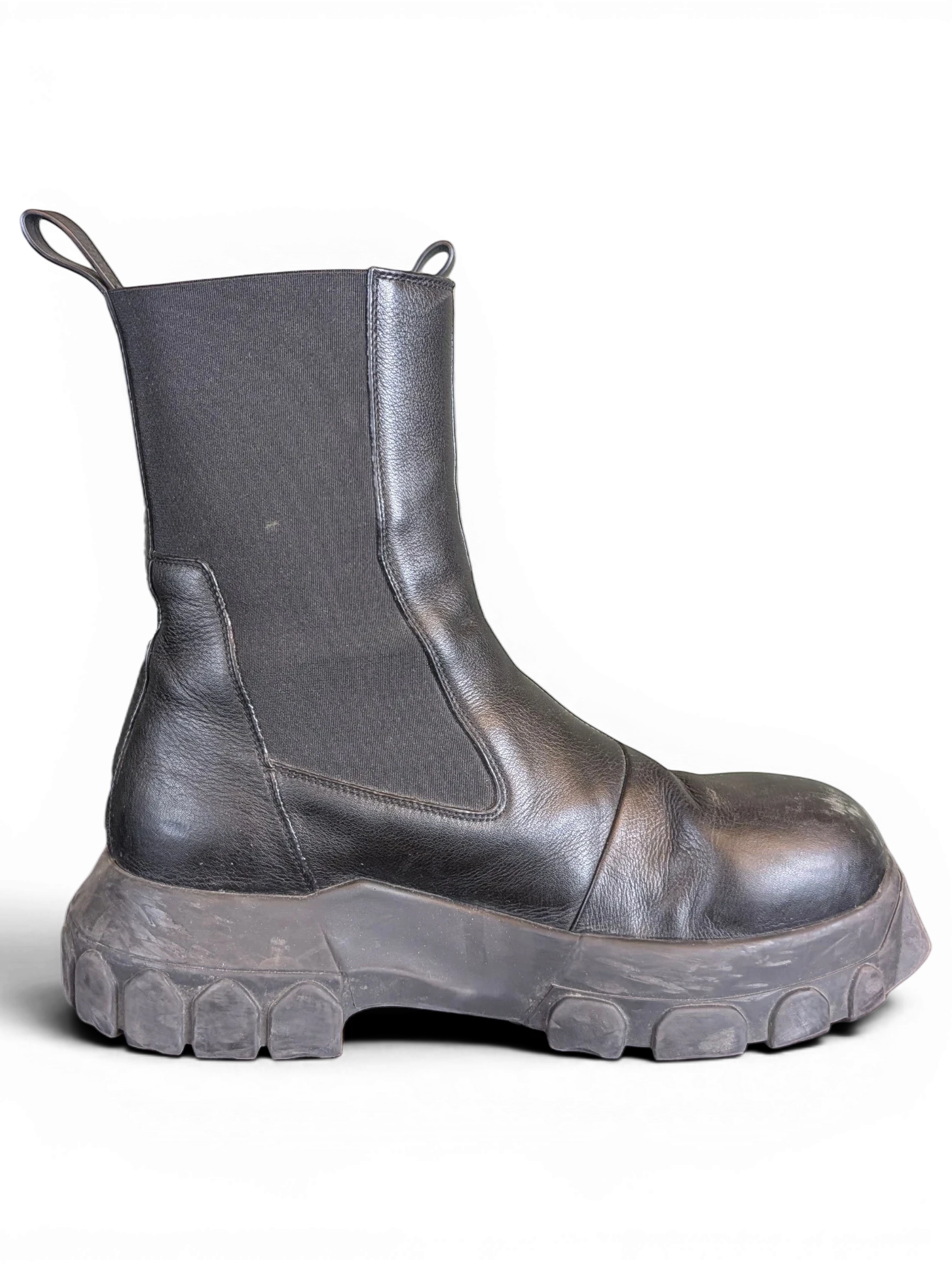 JAKE & IPI Rick Owens Beatle Bozo Tractor boots in metallic black leather with an oversized lug sole.