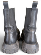 JAKE & IPI Rick Owens Beatle Bozo Tractor boots in metallic black leather with oversized lug soles, rear view.