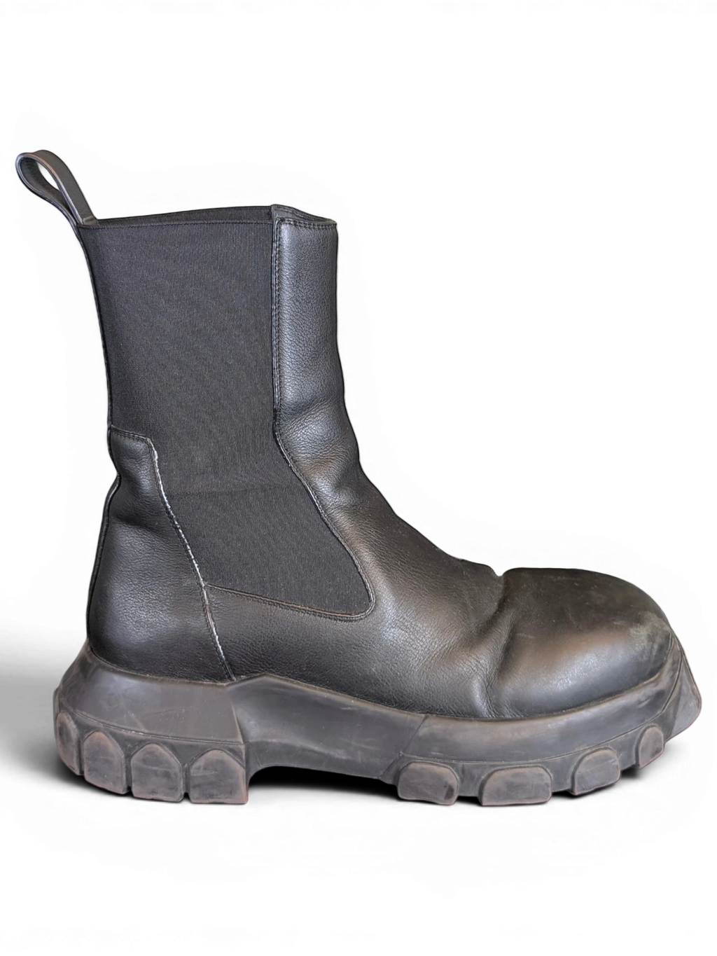JAKE & IPI Rick Owens Beatle Bozo Tractor boots in metallic black leather with an oversized lug sole and elastic side.