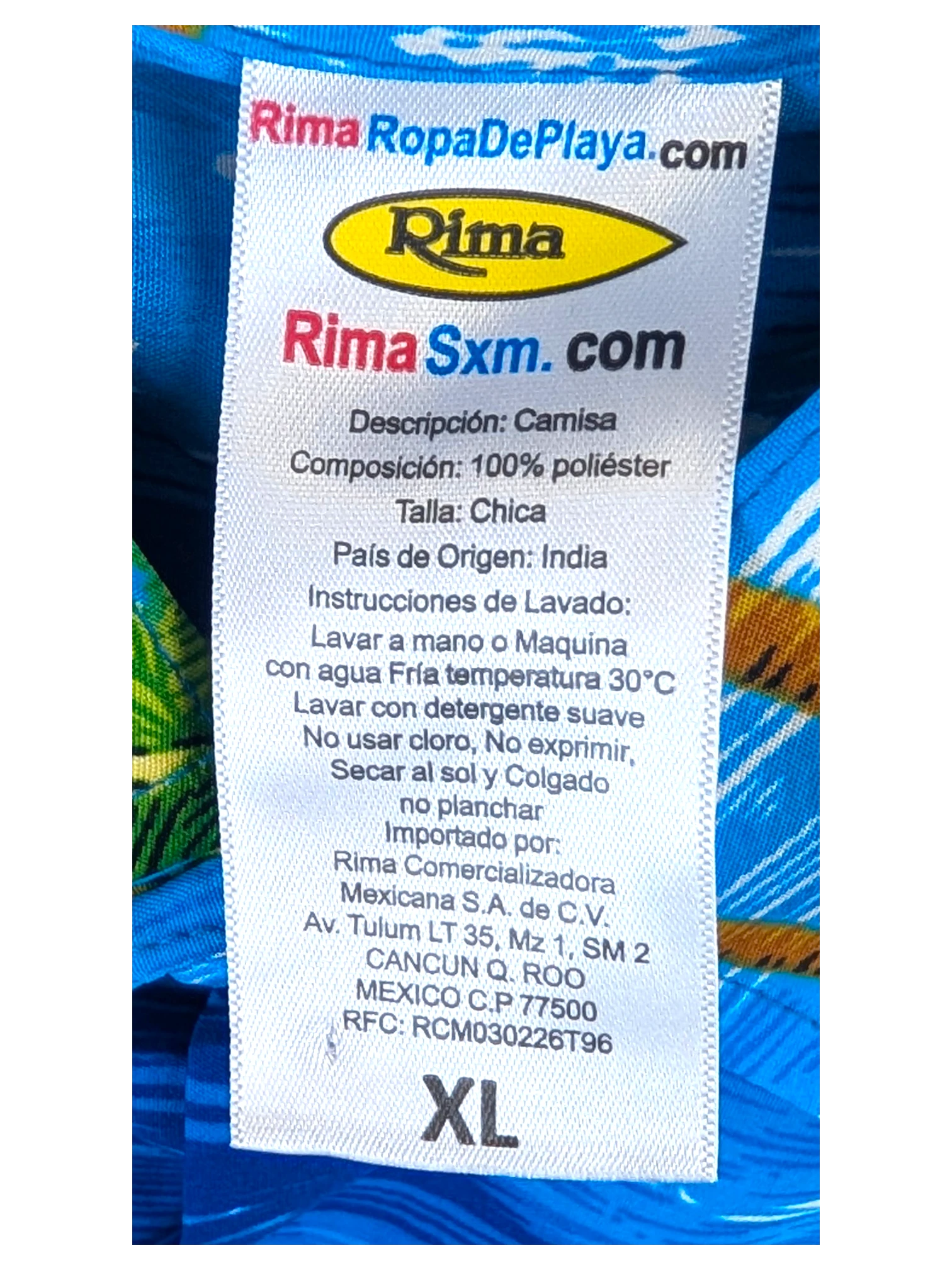 JAKE & IPI Rima Hawaiian shirt featuring a vibrant blue tropical palm tree print on 100% polyester fabric