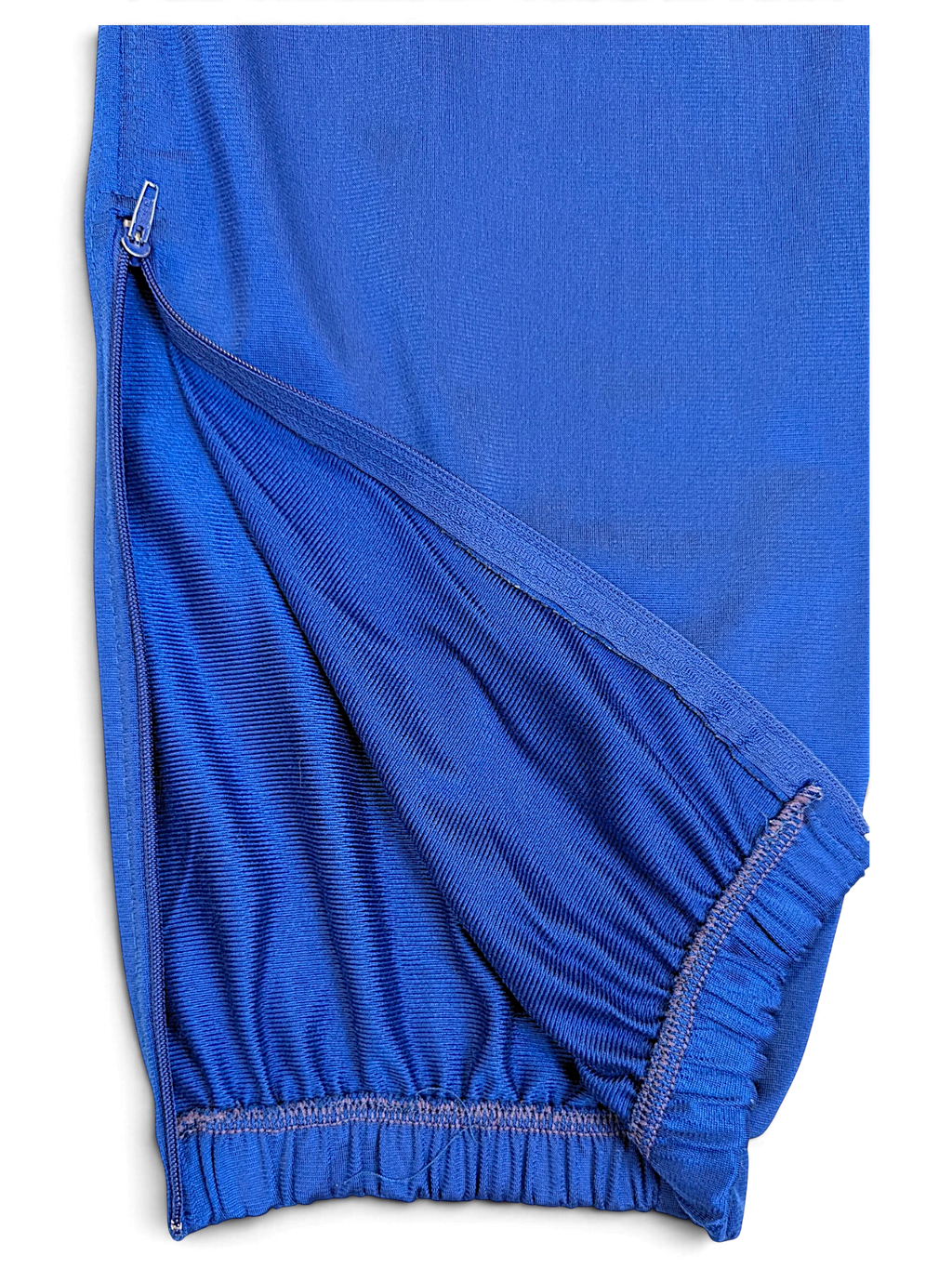 JAKE & IPI Rucanor royal blue retro track pants featuring a zippered leg opening and elasticated cuff detail.