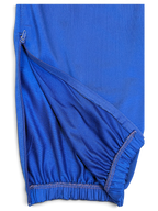 JAKE & IPI Rucanor royal blue retro track pants featuring a zippered leg opening and elasticated cuff detail.