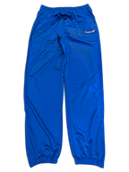 JAKE & IPI pre-owned Rucanor royal blue track pants with elastic waist and retro sportswear styling.