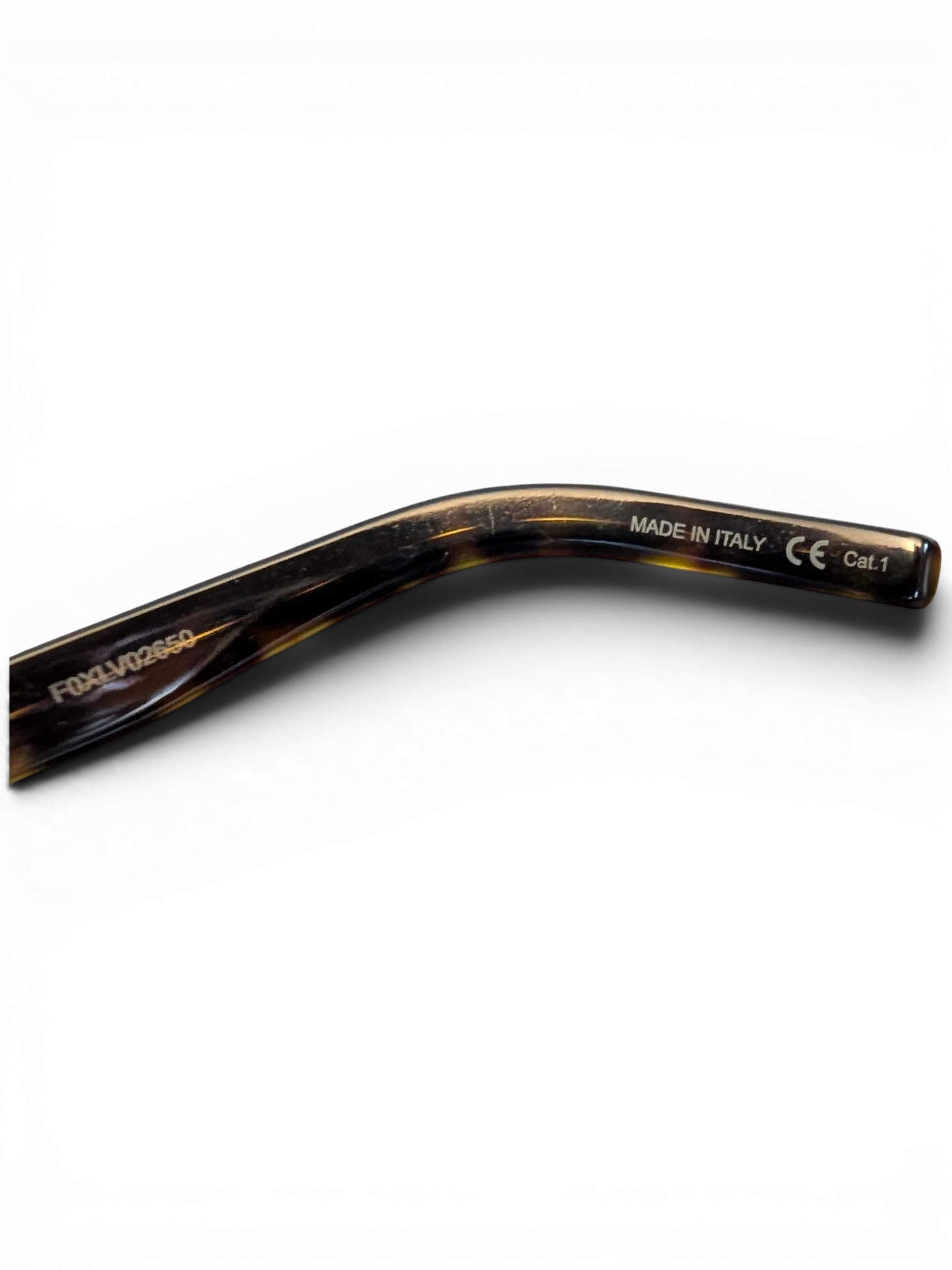 JAKE & IPI Saint Laurent SL461 Betty sunglasses temple detail showing Made in Italy engraving on tortoiseshell frame