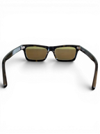 JAKE & IPI Saint Laurent SL461 Betty sunglasses featuring a tortoiseshell frame and rectangular lenses, rear view.