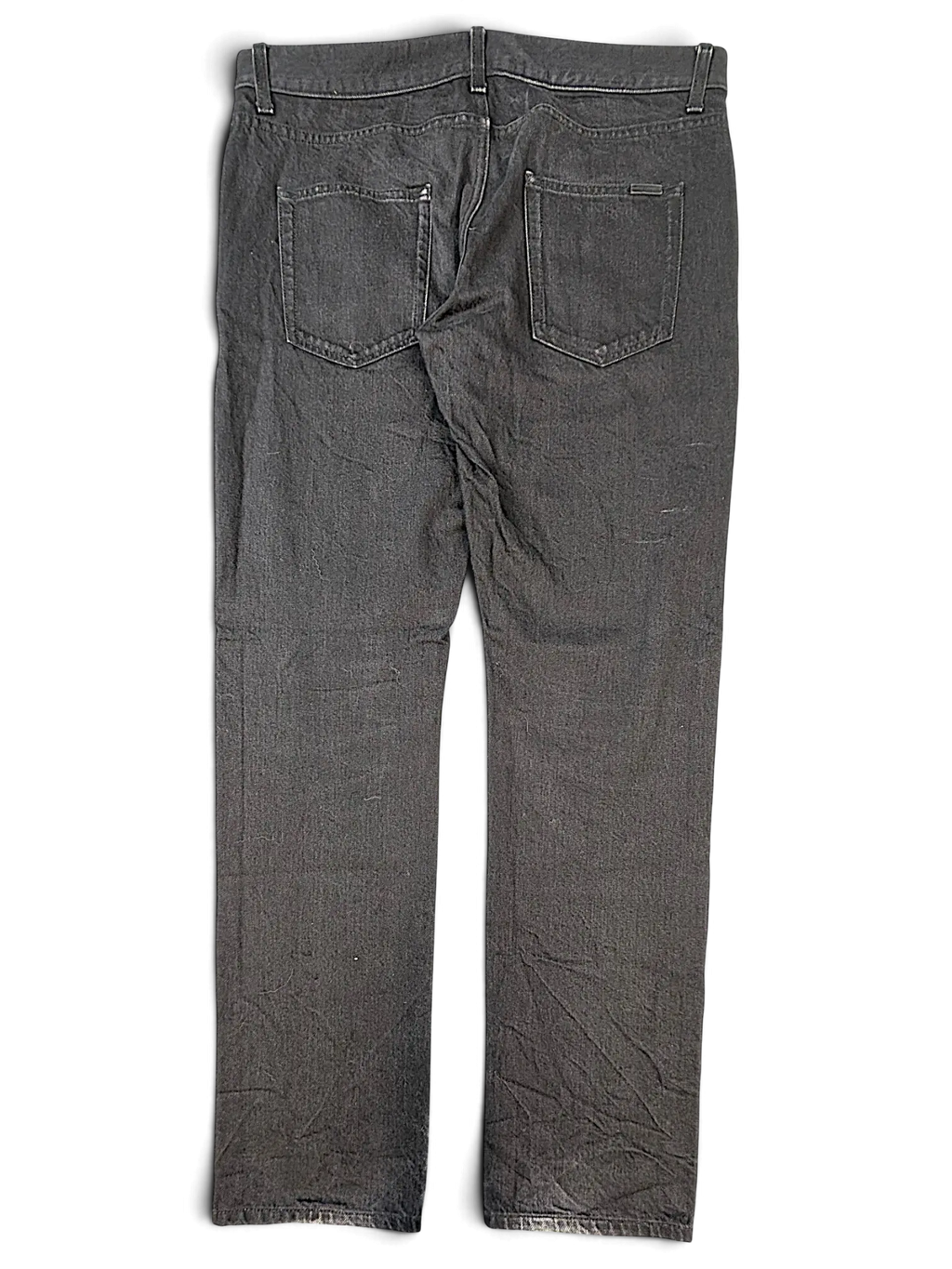 JAKE & IPI Saint Laurent black denim jeans, back view showing pockets and straight leg fit.