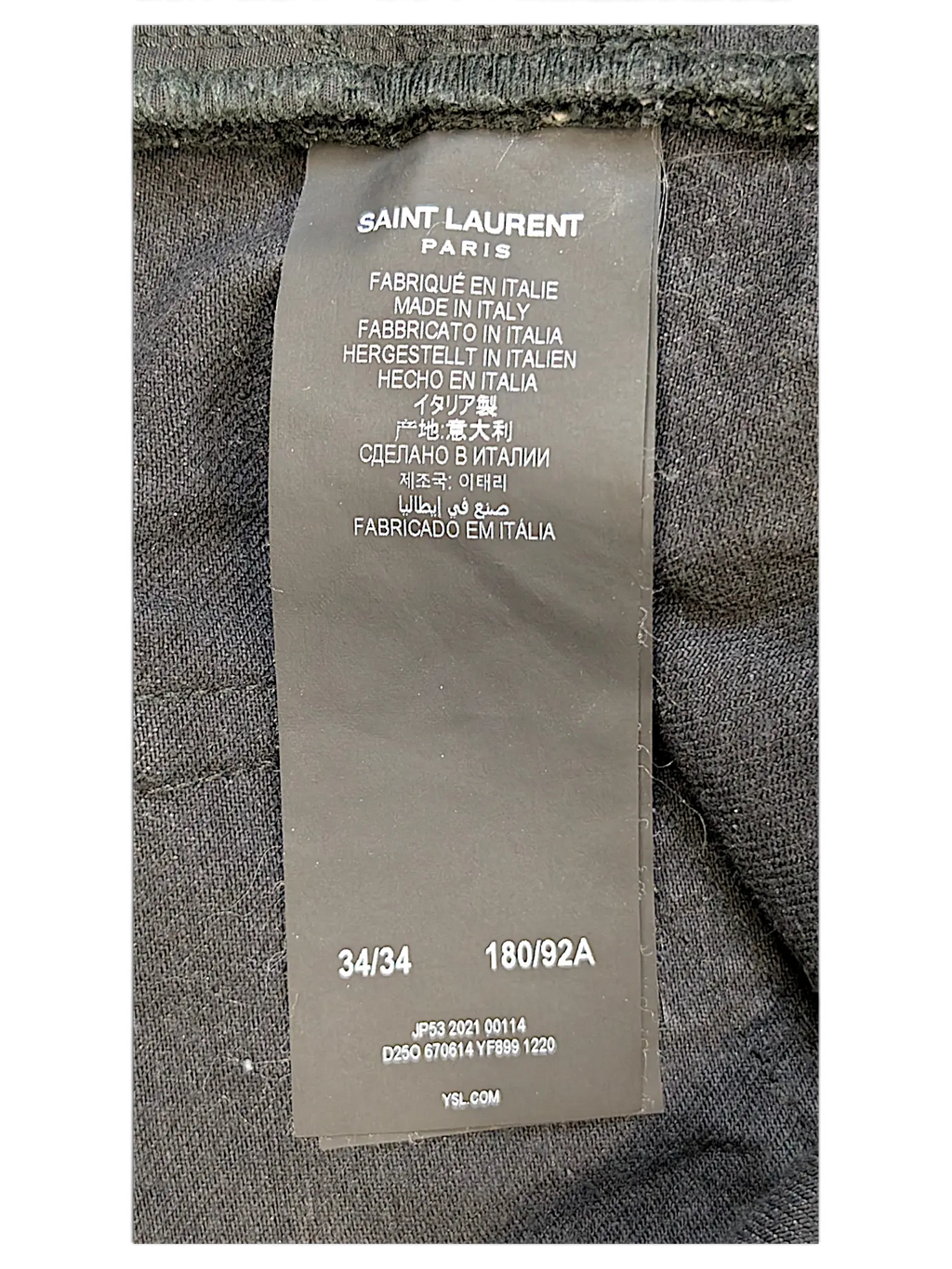 JAKE & IPI Saint Laurent jeans black fabric care label with size 34/34 and 180/92A details