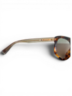 JAKE & IPI Saint Laurent SL558 sunglasses with a tortoiseshell frame and side view of the temple arm.