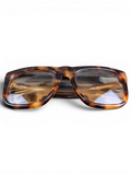 JAKE & IPI Saint Laurent SL558 sunglasses with a classic tortoiseshell acetate frame and tinted lenses