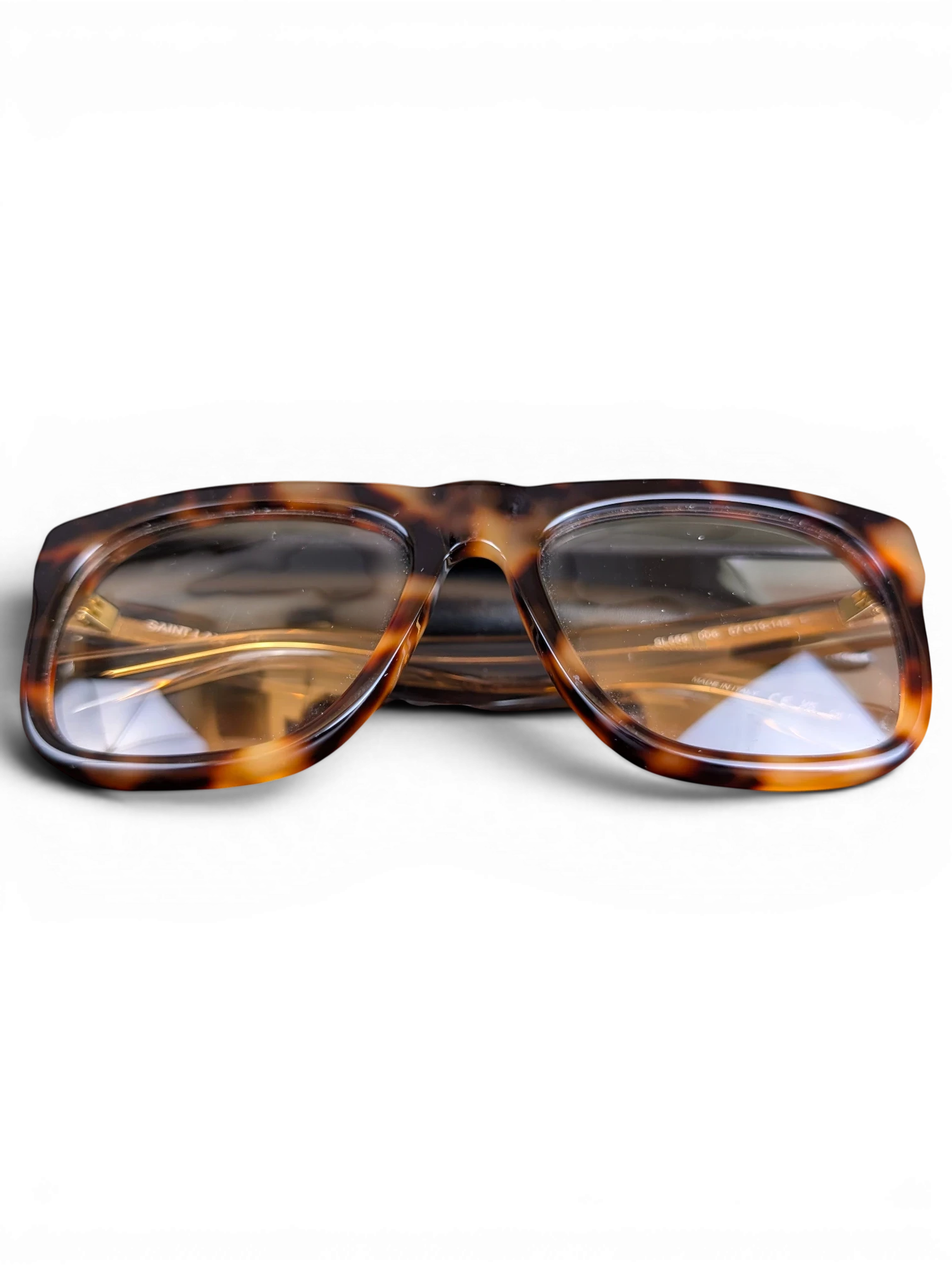 JAKE & IPI Saint Laurent SL558 sunglasses with a classic tortoiseshell acetate frame and tinted lenses