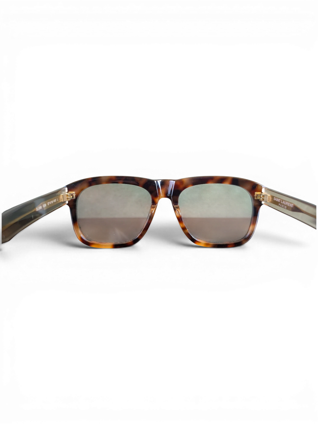 JAKE & IPI Saint Laurent SL558 sunglasses in a classic tortoiseshell pattern with a square frame design.