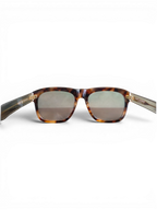 JAKE & IPI Saint Laurent SL558 sunglasses in a classic tortoiseshell pattern with a square frame design.