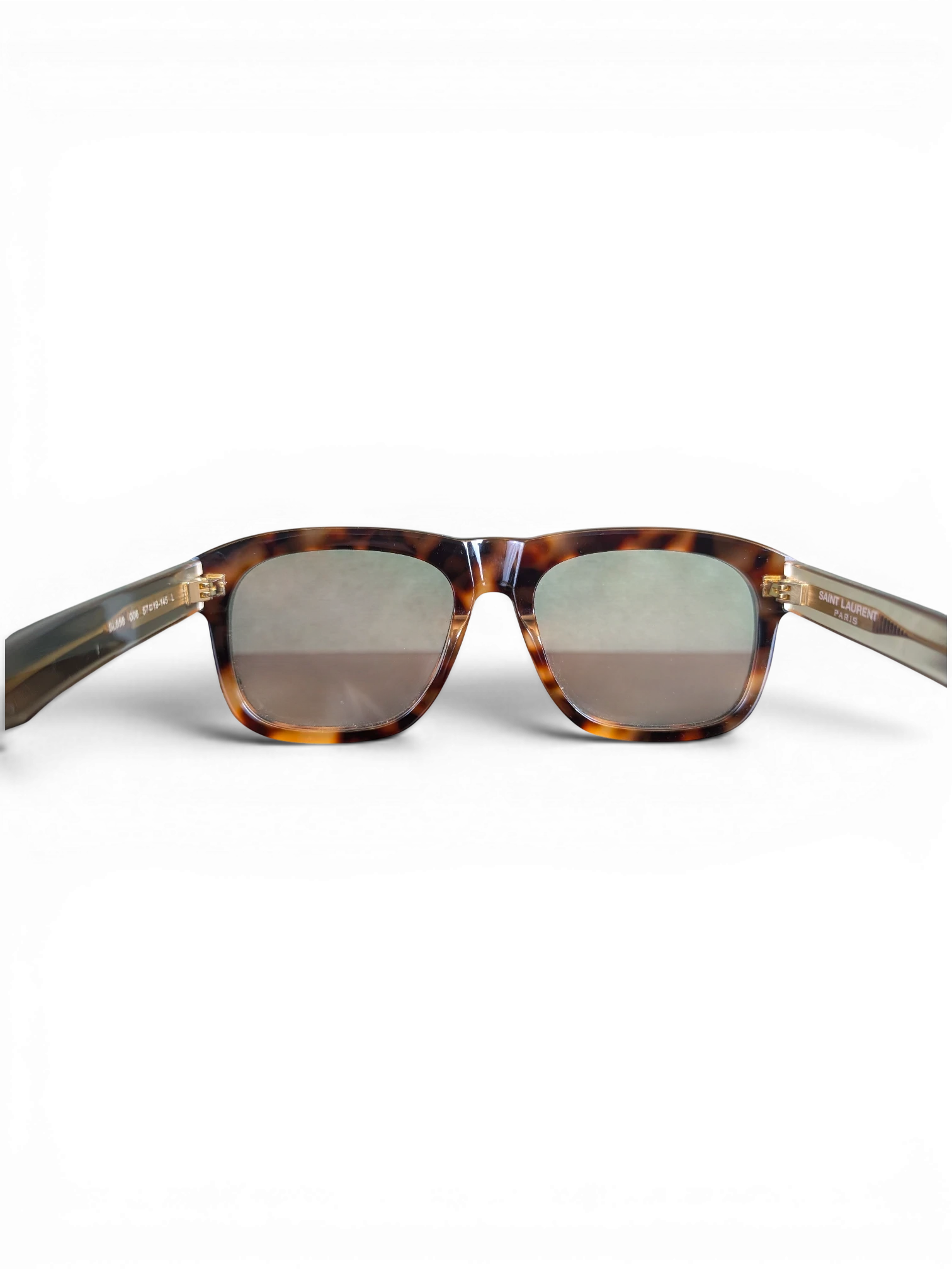 JAKE & IPI Saint Laurent SL558 sunglasses in a classic tortoiseshell pattern with a square frame design.