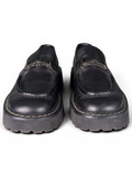 JAKE & IPI pre-owned black leather Salvatore Ferragamo loafers featuring silver metal hardware and chunky rubber soles.