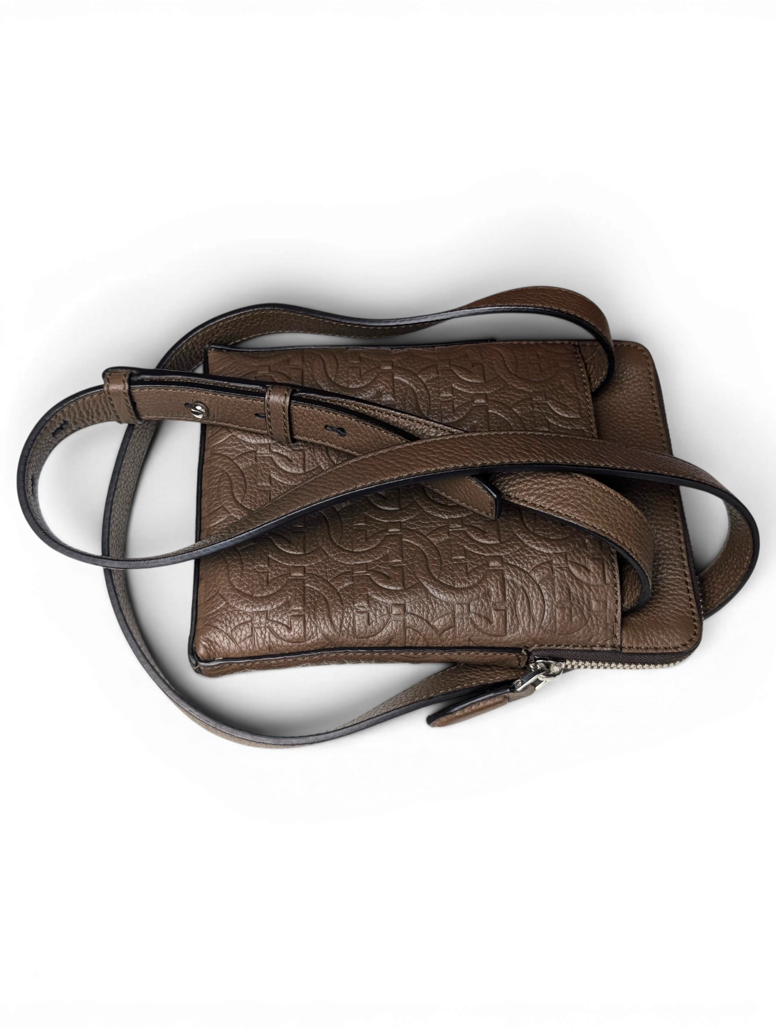 JAKE & IPI Salvatore Ferragamo brown leather messenger bag with embossed Gancini logo and adjustable shoulder strap.
