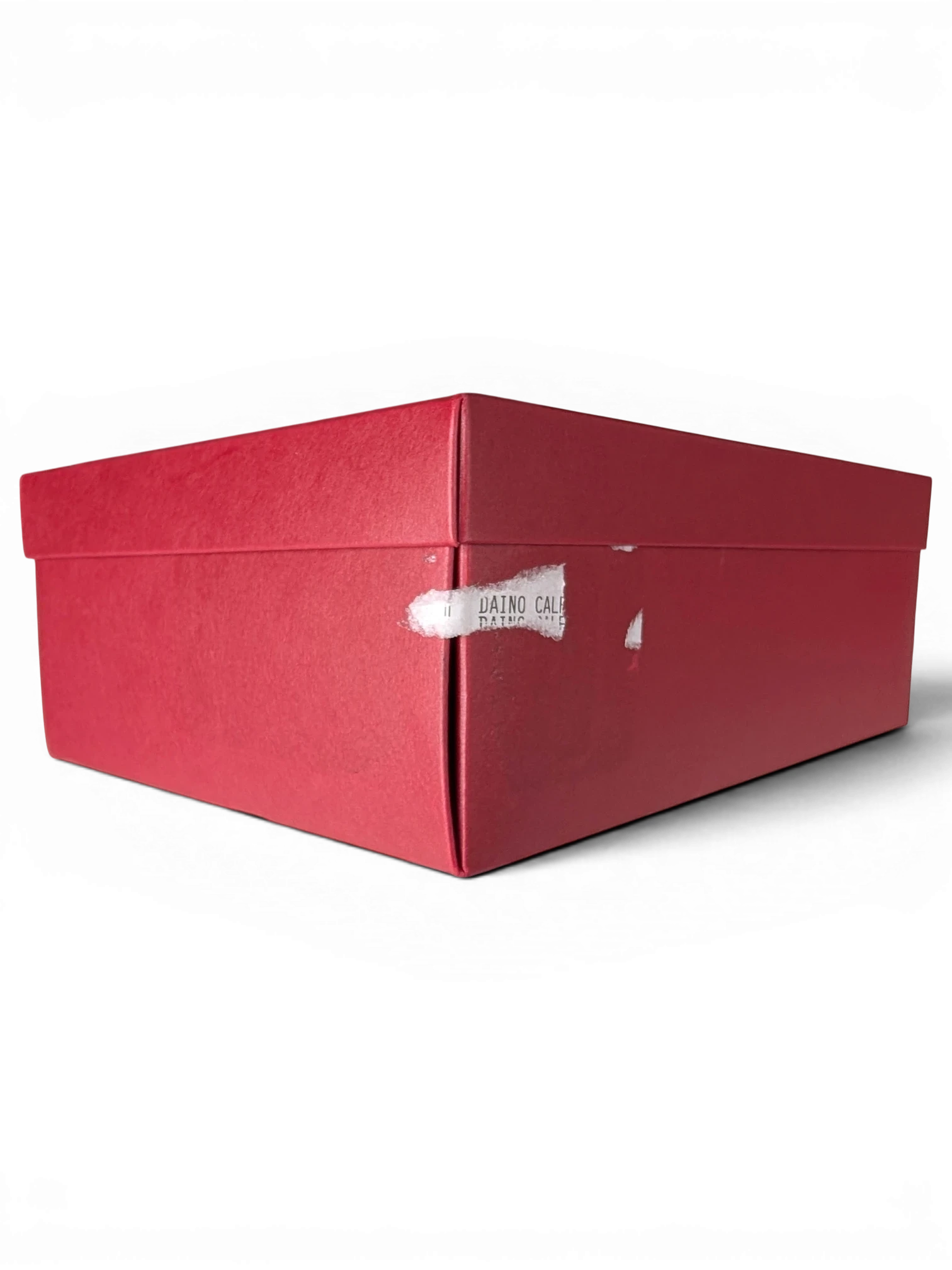 JAKE & IPI red Salvatore Ferragamo designer shoe box with a partial product label on the side