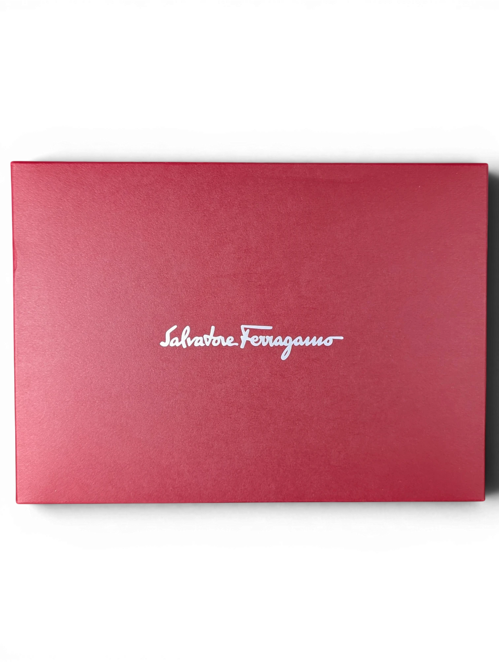 JAKE & IPI red Salvatore Ferragamo branded gift box with white logo text