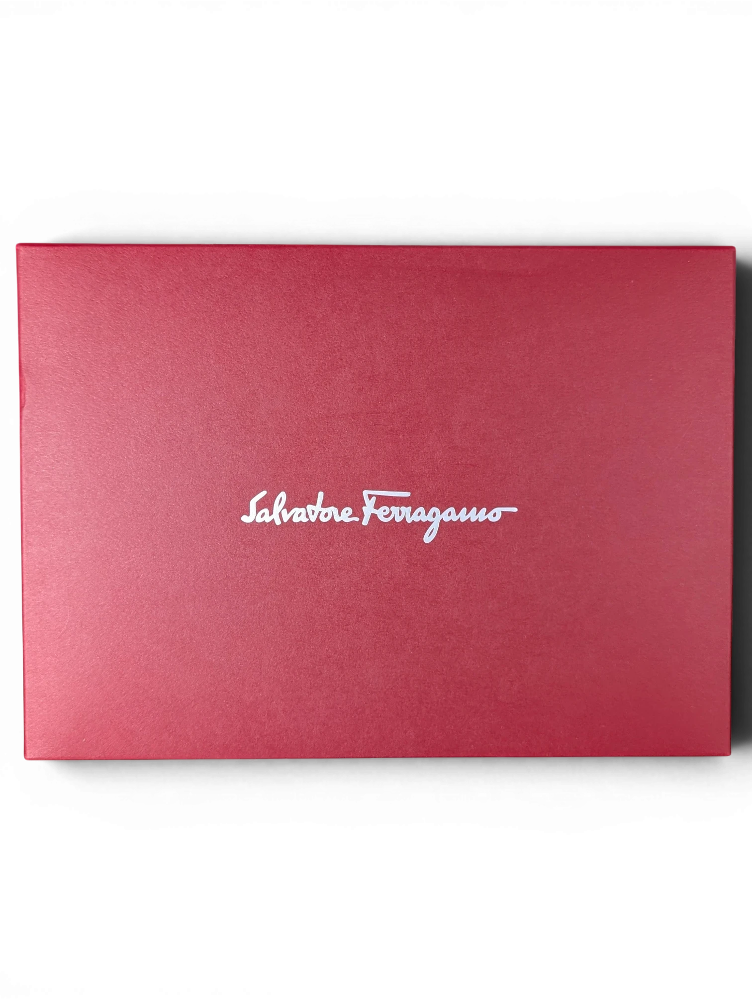 JAKE & IPI red Salvatore Ferragamo branded gift box with white logo text