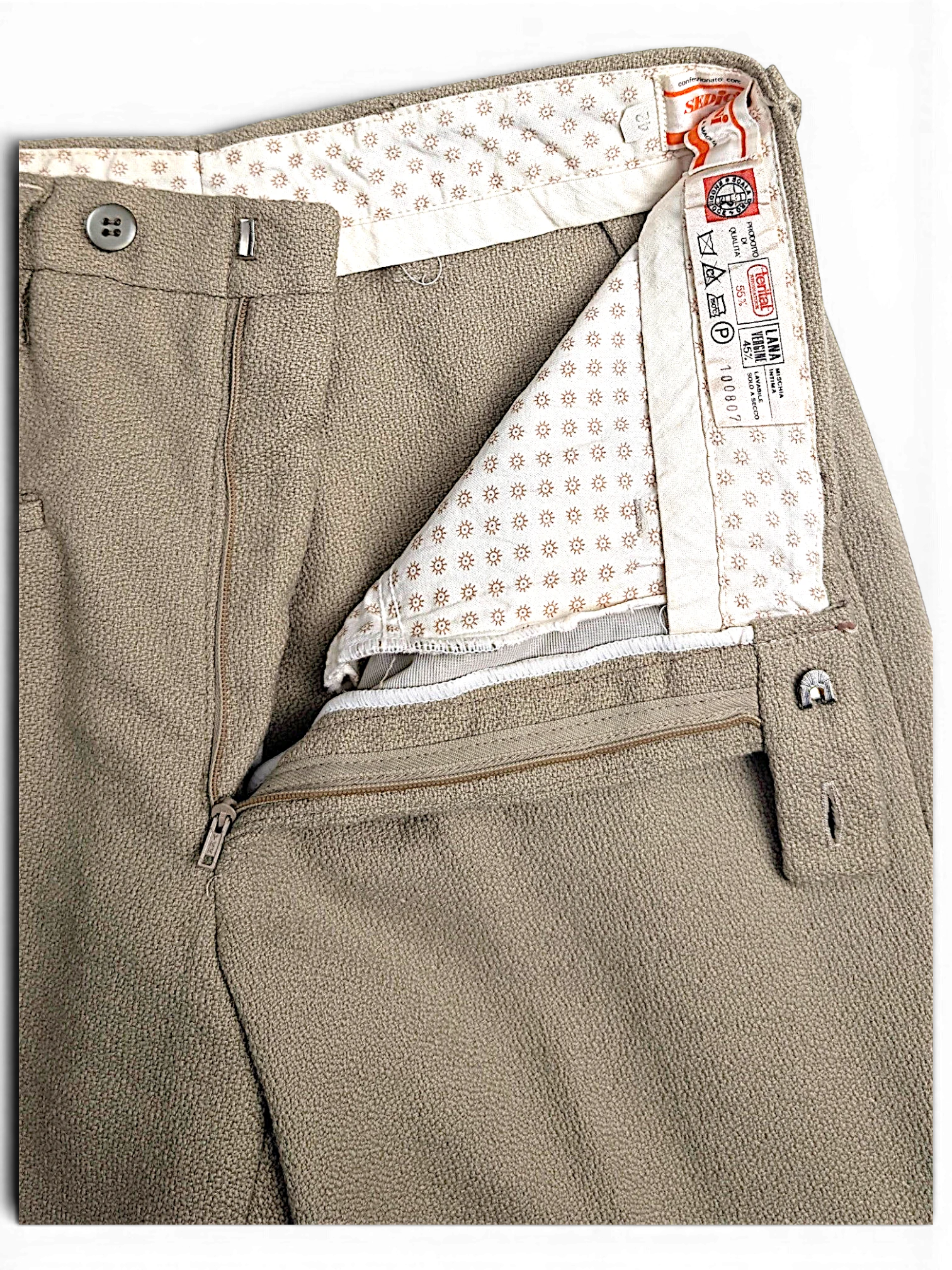 JAKE & IPI Sedici Anni beige wool-blend trousers featuring a textured fabric and patterned interior lining
