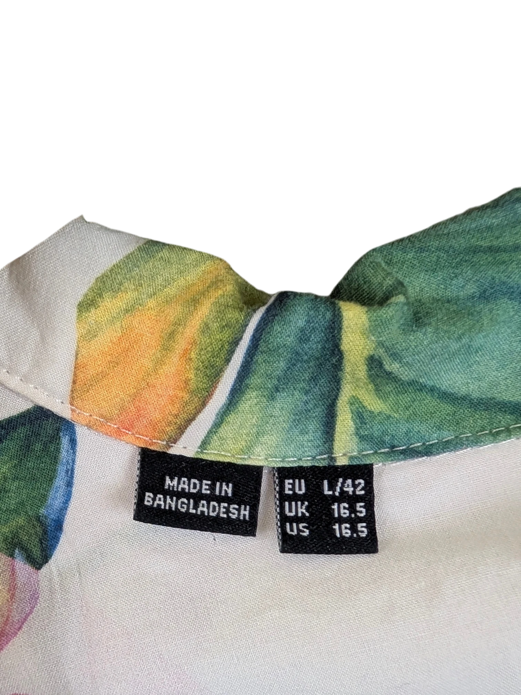 JAKE & IPI Selected Homme Hawaiian shirt featuring a white base with green and orange tropical leaf print